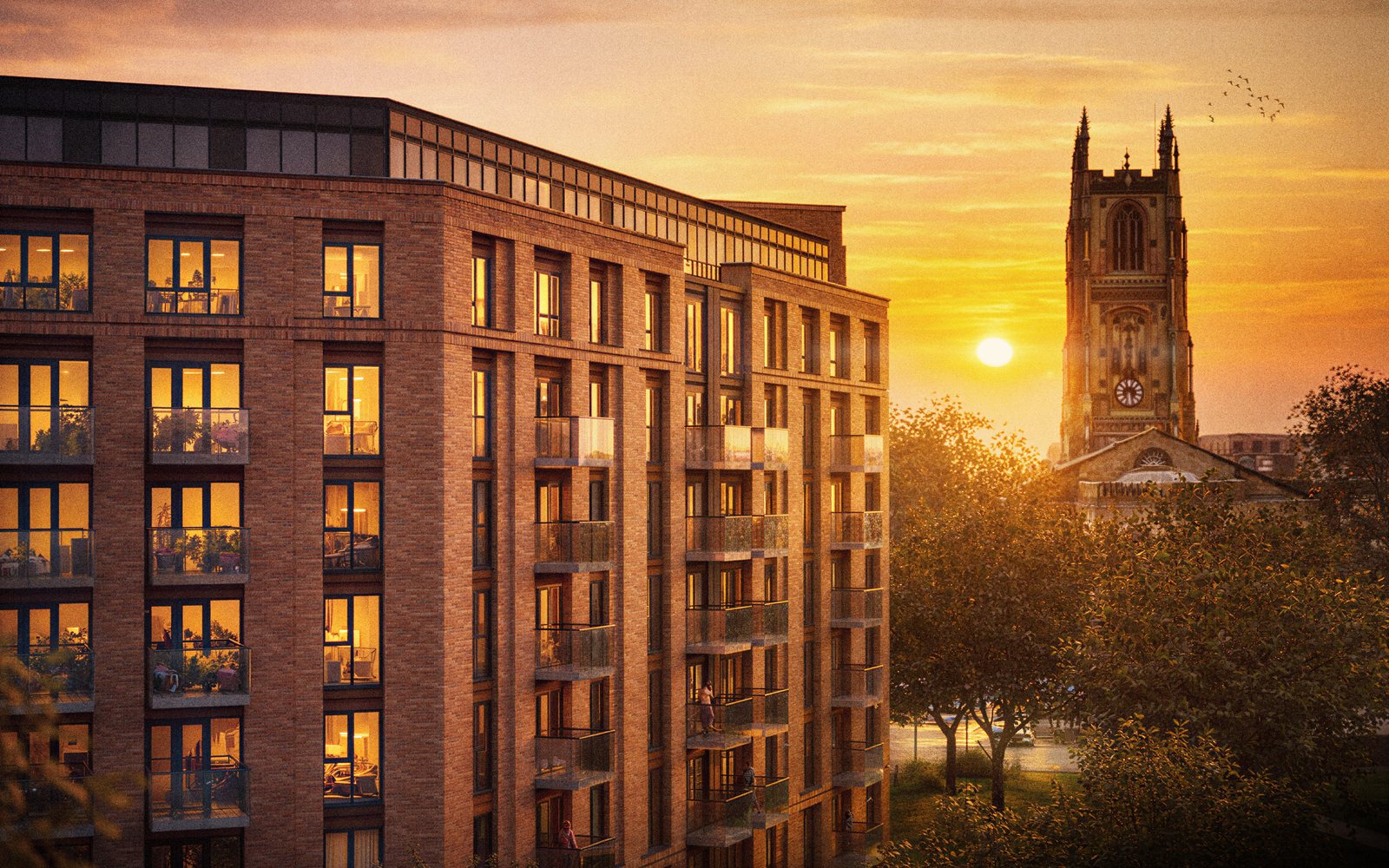 Derby development at sunset, with the cathedral tower beyond